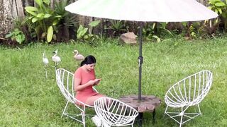 Martina is filmed from afar by a fan while she