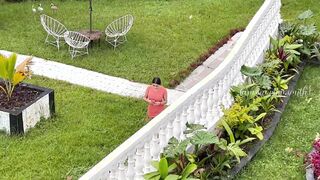 Martina is filmed from afar by a fan while she
