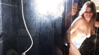 Young man eating his friend's aunt inside the restroom of