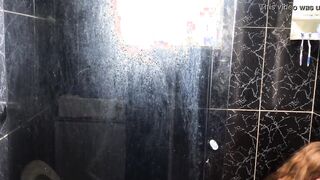 Young man eating his friend's aunt inside the restroom of