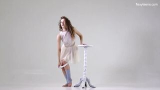Ursula Fe dark hair curly hair gymnast