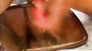 MILF masturbating with dildo and squirt on a glass
