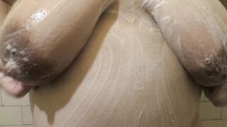 Pregnant wifey Milky Mari washing her long hooters and big belly into shower, covered with a foam