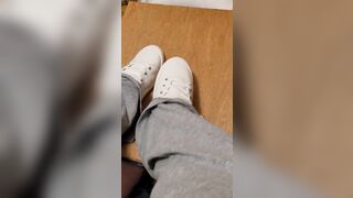 Rubbing his penis with white shoes