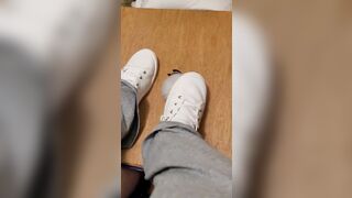 Rubbing his penis with white shoes