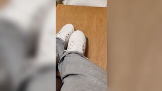 Rubbing his penis with white shoes