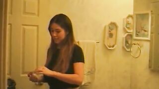 Big Titted chinese dark haired strokes her clitoris while taking a toy up her snatch