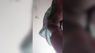 Under the skirt. Enjoy the long bushy twat.