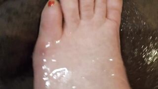 Ebony cum on white foot