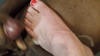 Ebony cum on white foot