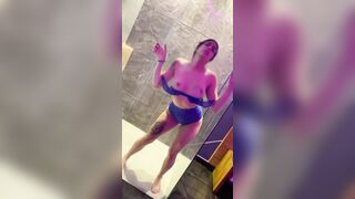 Arab doing striptease inside a hotel WC