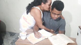 My stepmom blows my penis while I'm doing homework. I come inside her face.