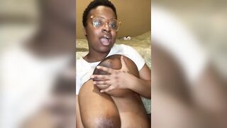 Huge Tit Black Rubbing Oil on her Jugs and Unshaved Twat