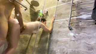 A young pervert looked at his stepmother inside the shower