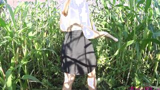 Kate Wood plays with her snatch into a cornfield