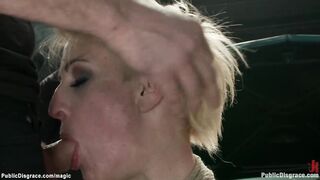 Blonde in rope bondage fisted in public