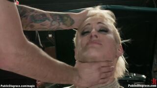 Blonde in rope bondage fisted in public