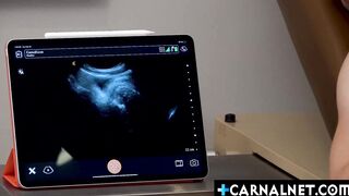 Doctor and nurse practice the use of ultrasound device