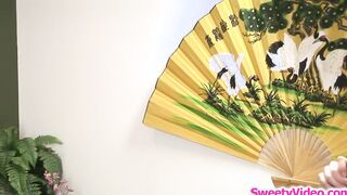 Lesbian masseuse scissoring with client