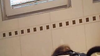 mom with long boobs is pee inside the WC