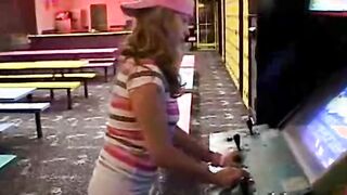 Outdoors 18 year old masturbates inside arcade toilets