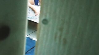 watching my sister into law masturbating and into a g-string through the door