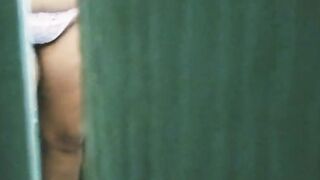 watching my sister into law masturbating and into a g-string through the door