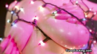 Big oily tits wrapped in lights crave for dick