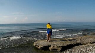 Dancing on Mediterranian Sea Beach with Yellow-Blue Shawl