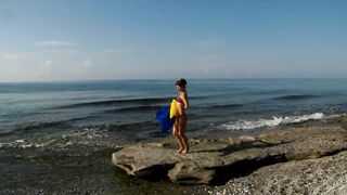Dancing on Mediterranian Sea Beach with Yellow-Blue Shawl