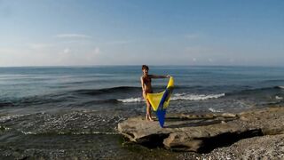 Dancing on Mediterranian Sea Beach with Yellow-Blue Shawl