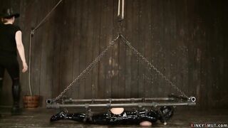 Big Titted cougar tied into pvc and hung