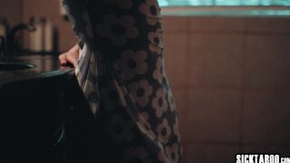 Jane Wilde kneels between two big cocks