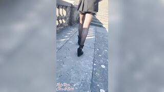 Flashing Outdoors inside mini skirt and nylon tights