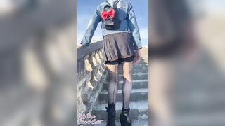 Flashing Outdoors inside mini skirt and nylon tights