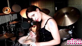 Dyke Nina with drums showing her incredible body