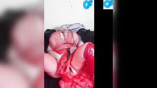 Susi is wearing a red fishnet suit fucking snatch with bbcs dildo