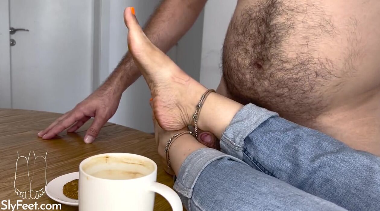 Love4Porn Presents Toejob and cum on foot while coffee time break