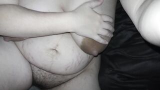 Slutwife Milky Mari starting to masturbate her very bushy cunt while her big boobies are flowing with a breast milk