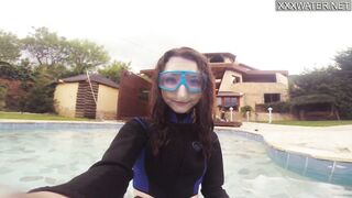 Emi Serene grind her vagina and films it into the swimming pool