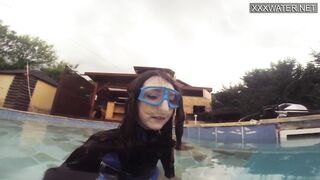 Emi Serene grind her vagina and films it into the swimming pool
