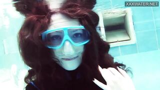 Emi Serene grind her vagina and films it into the swimming pool