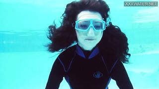 Emi Serene grind her vagina and films it into the swimming pool