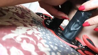 Zhoe tries on a double strap-on inside leather briefs