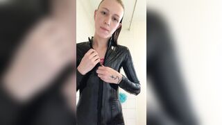 hot blonde bimbo gets naked out of rubber cat suit inside shower