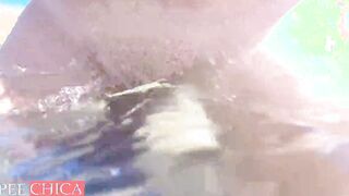 Cutie BBW pissing on outdoor beach inside water