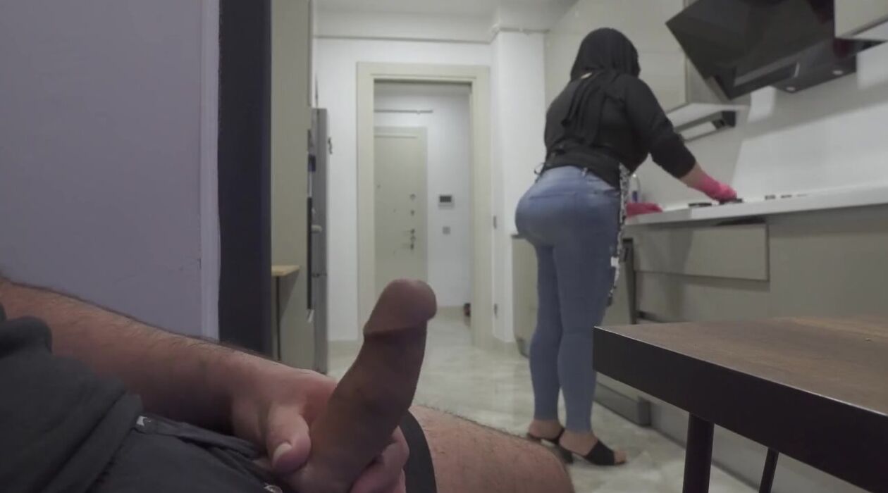 Love4Porn Presents Risky jerking off while watching long booty hijab stepmom inside the kitchen. pic