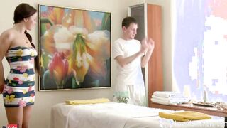 Masseur slides his cock into while working