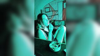 Bombshell stepsister smokes a cigarette