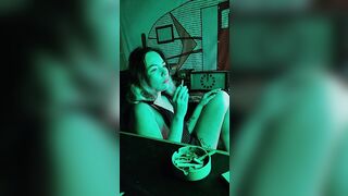 Bombshell stepsister smokes a cigarette
